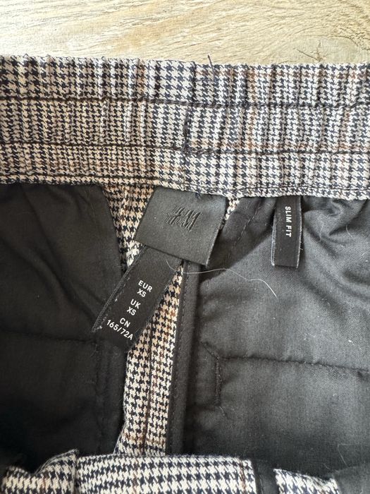 Męskie spodnie H&M w kratę rozm. XS