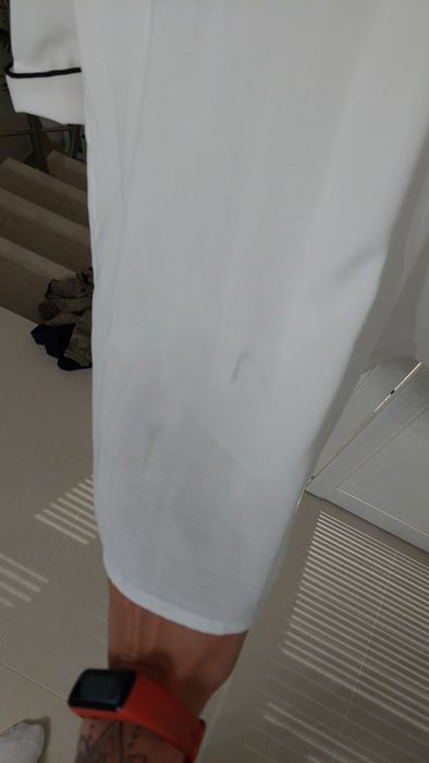 Biała elegancka bluzka firma Moodo