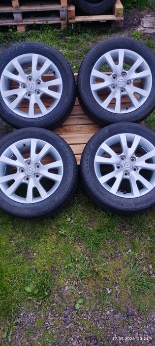 Felgi alu oryg Mazda 5x114,3 z oponami letnimi Bridgestone 205/55 R16, 4szt