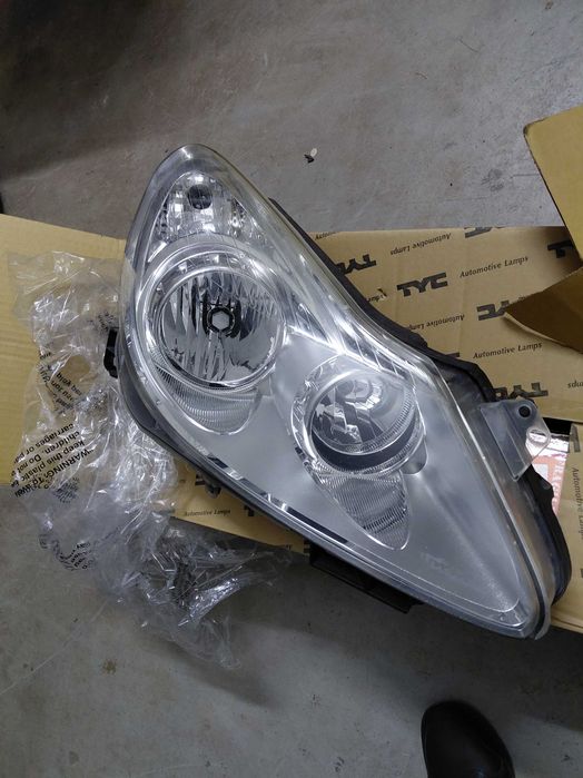 Lampa przód przednia prawa Opel Corsa D 2006-14r oryginał GM