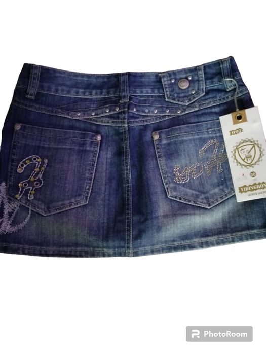 (Розмір 30) (Розмір 29) Джинсовая юбка с потертостями. Мини длина. Вкл