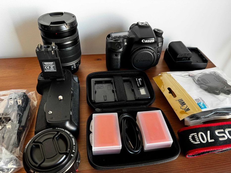 Canon EOS 70D + 18-200mm IS + 50mm f/1.8 + acessórios