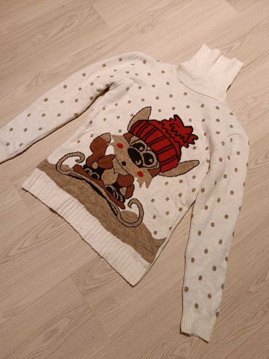 różne ciepłe swetry