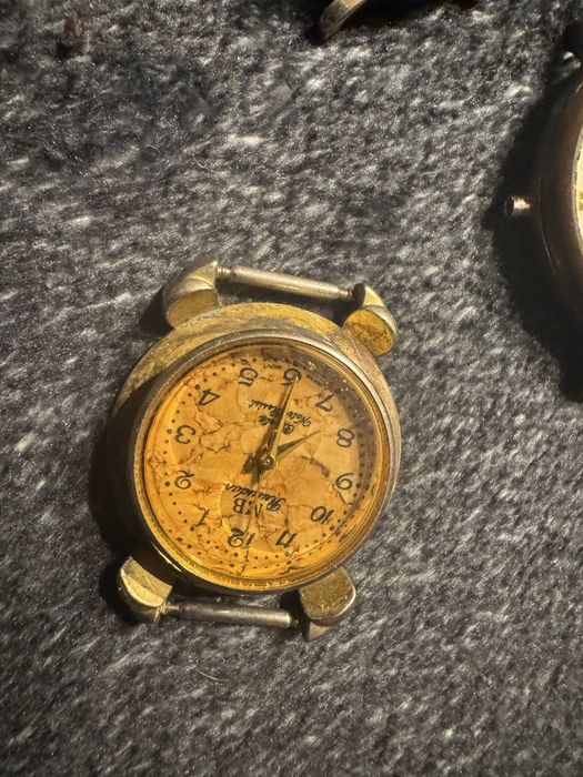 Zestaw 12 zegarków na rękę oraz dwie