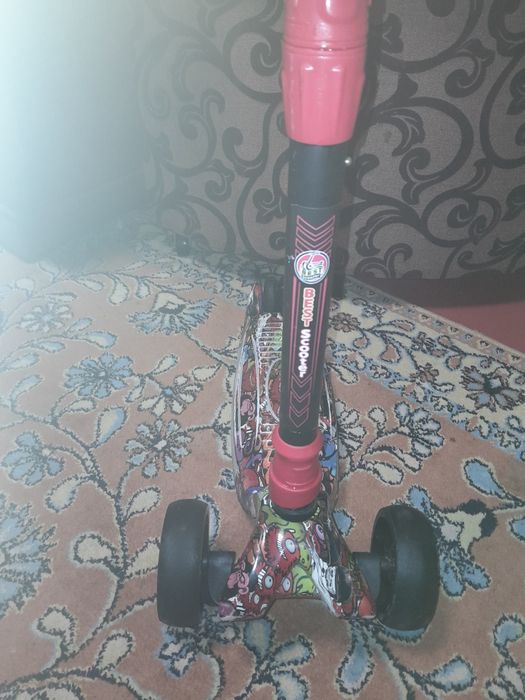 Трехколесный самокат