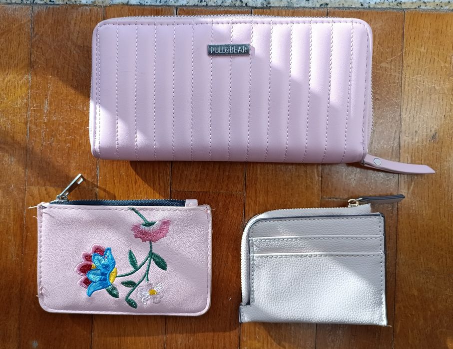 Carteiras como novas