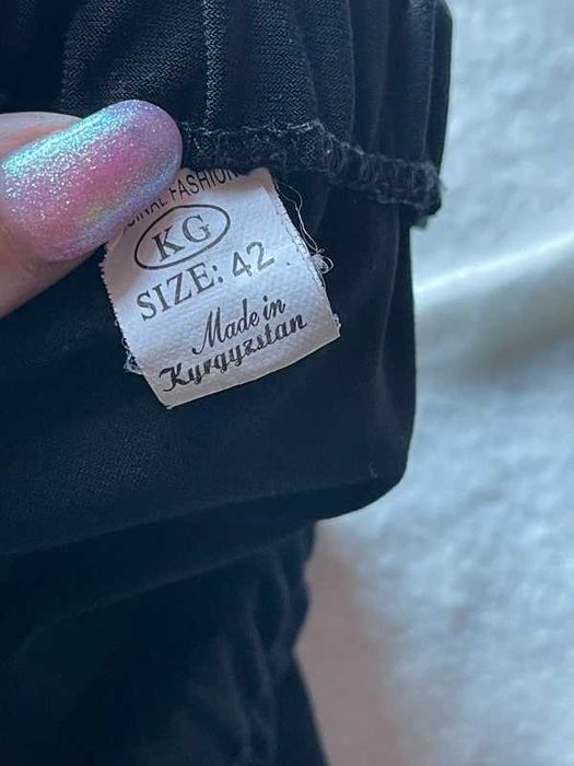 Czarne legginsy z szerokimi nogawkami - 42
