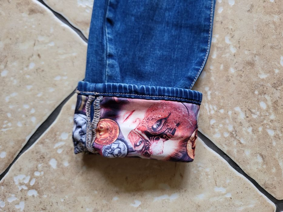 Spodnie dżinsowe L z ozdobnymi mankietami