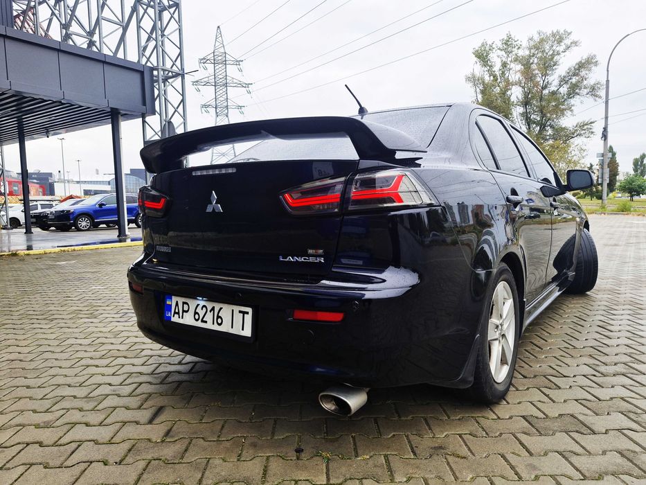 Митсубиши Лансер Х