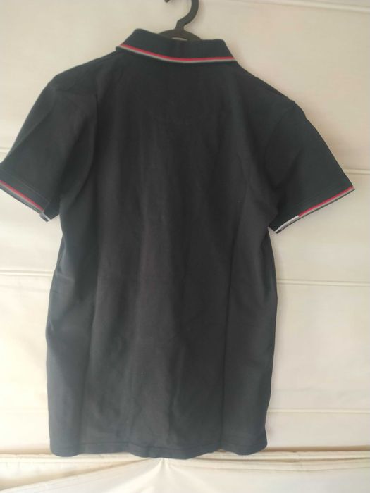 Polo preto Tifosi, tamanho S, em bom estado.