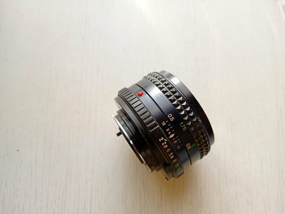 Объектив Япония Minolta lens made in Japan md rokkor 1:2 f 50 mm.