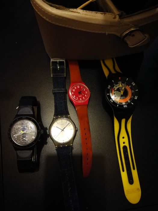 Quatro relógios swatch