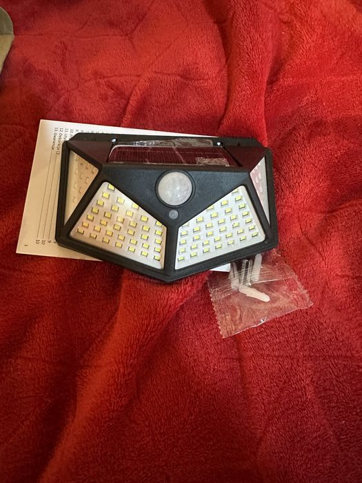 Solarna lampa ścienna LED 100 diod + czujnik ruchu IP44 nowa