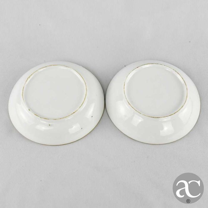 Par de chávenas de café e pires em porcelana europeia, séc. XIX