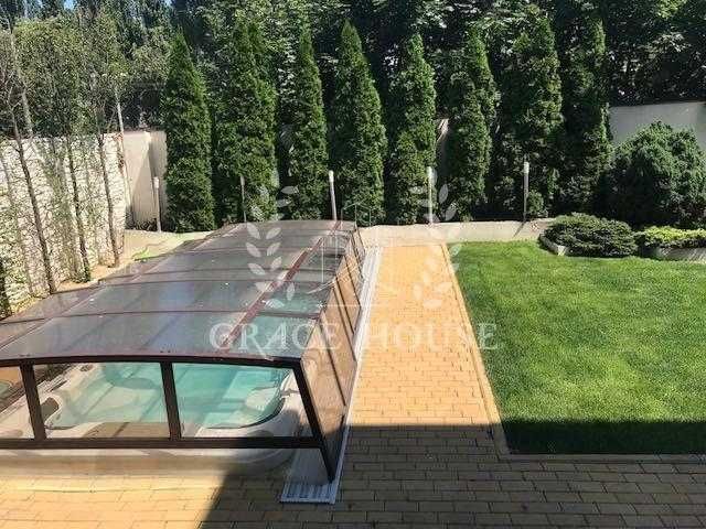 Продажа дома с ремонтом на Нивках 290 м2. бассейн, закритий КГ, охрана