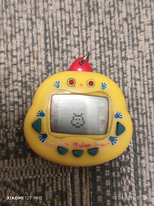Продам игрушка тамагочи