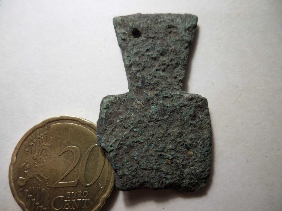 'Peça' antiga em Metal