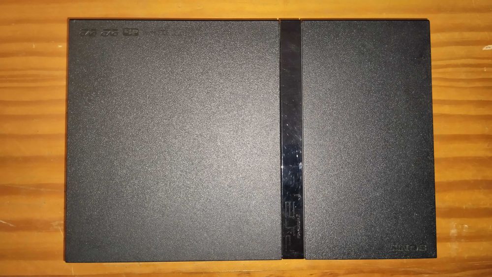 Consola PS2 Slim com lente Nova