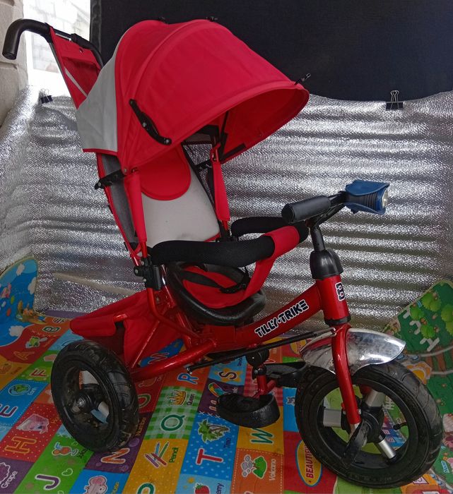 Продам детский музыкальный велосипед-коляска Lamber trike почти новый.