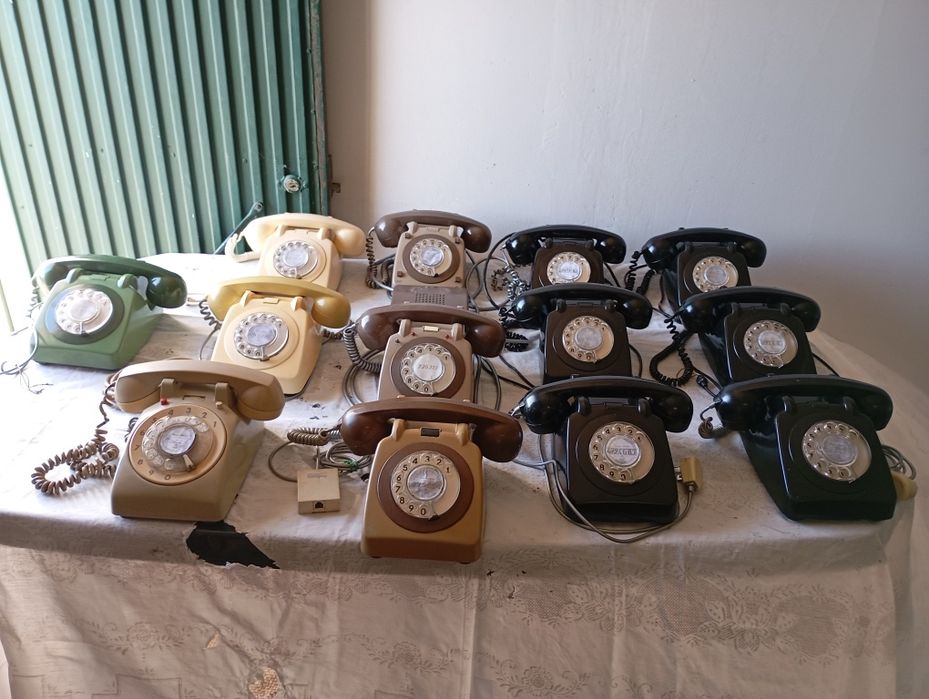 Green rotary-dial telephones, gray cream and black 1 1