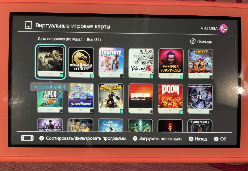 Nintendo Switch Lite рожевий + багато ігор