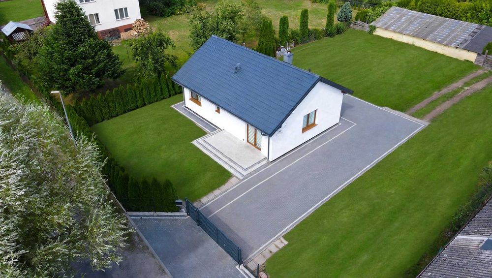Przytulny dom parterowy 68 m² na dużej, ogrodzonej działce 20 arów