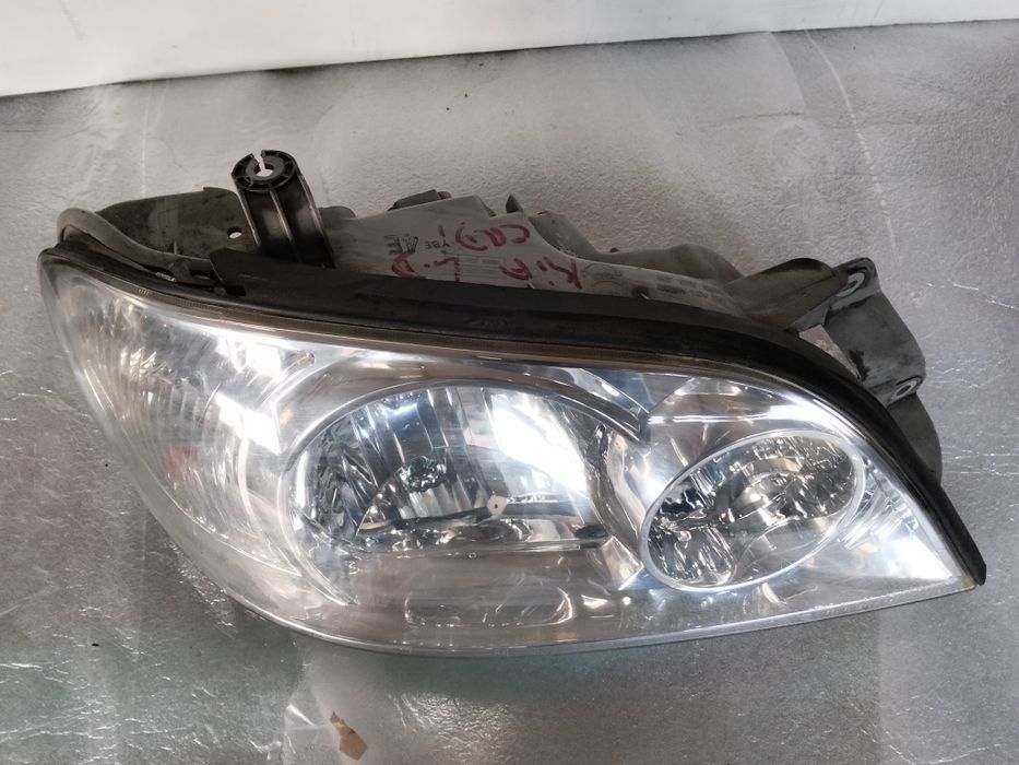 Farol Kia carnival 2 ótica original 2003  facelift