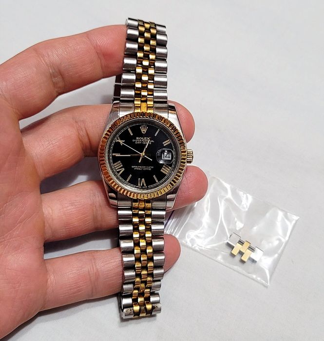 Швейцарские часы Rolex в белом цвете с золотом корпус из нерж.стали механизм quartz выпуск Swiss 80х годов марка времён ссср