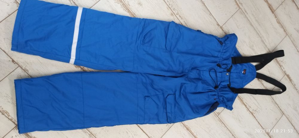 Niebieskie ocieplane spodnie robocze na szelkach 58 XXXL nowe