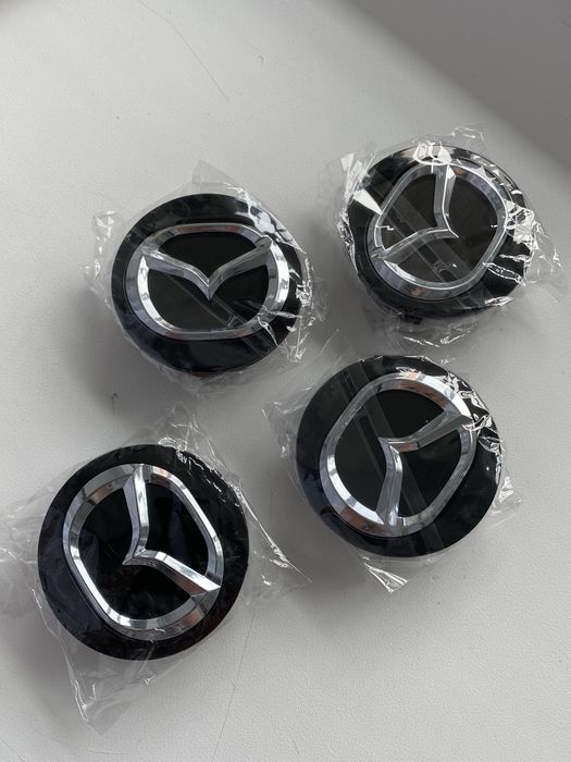 Колпачки в центр колеса Mazda 57мм/49мм (заглушки)