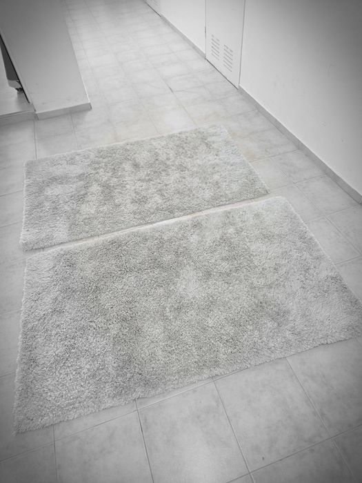 2 tapetes creme de 160x85 cms