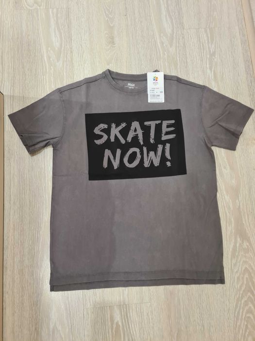 Якісна нова футболка у розмірі 146-152см