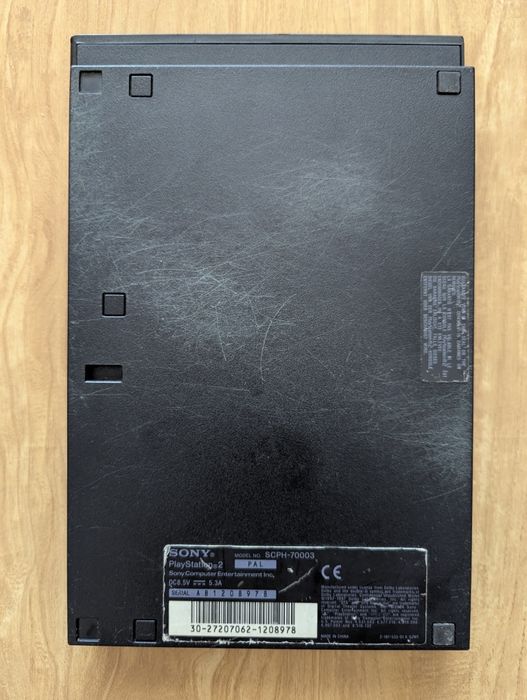 PlayStation 2 Slim + 3 gry