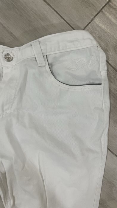 white flared jeans