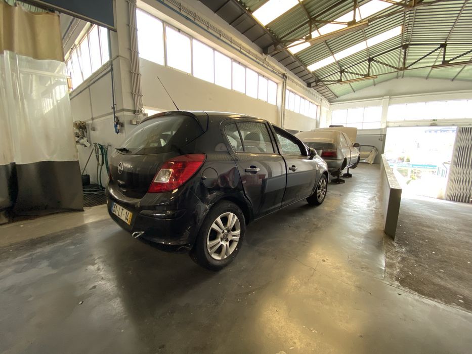 Opel Corsa D 1.2 Gasolina - Salvado