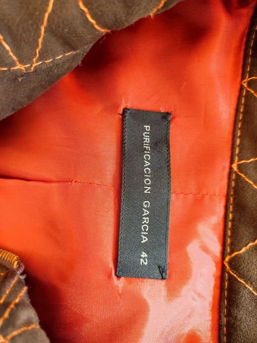 casaco de antilope castanho