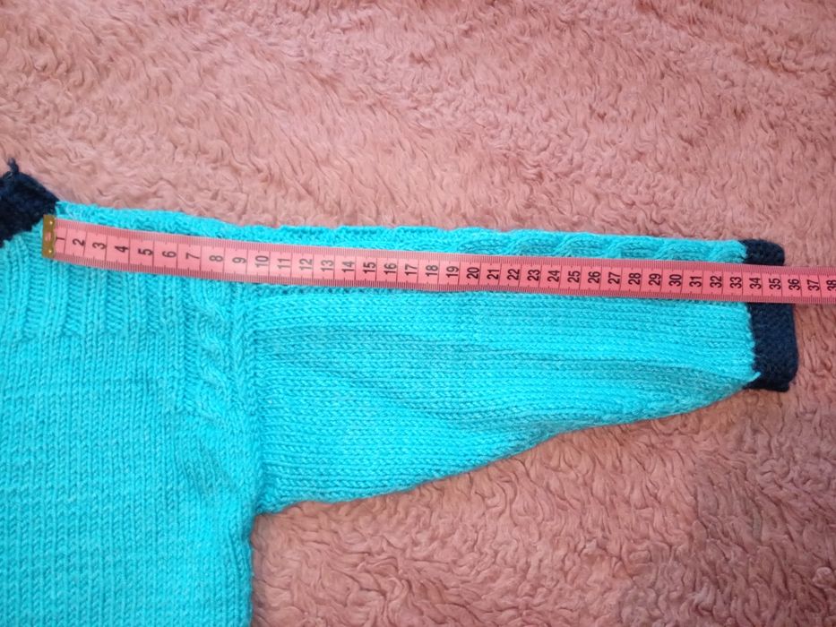 Теплі кофти ручної роботи