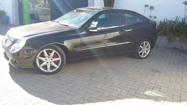 Mola de suspensão trás esquerda MERCEDES-BENZ Classe C Coupé (CL203)