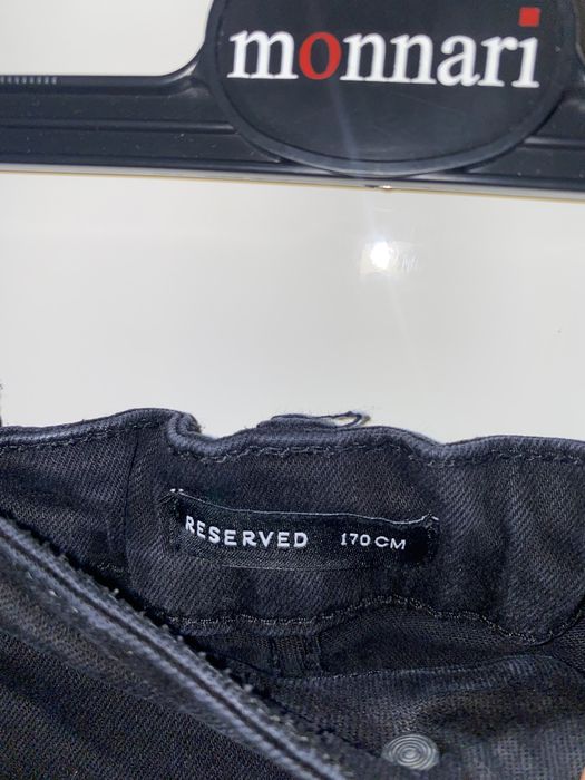 Czarne jeansy Reserved