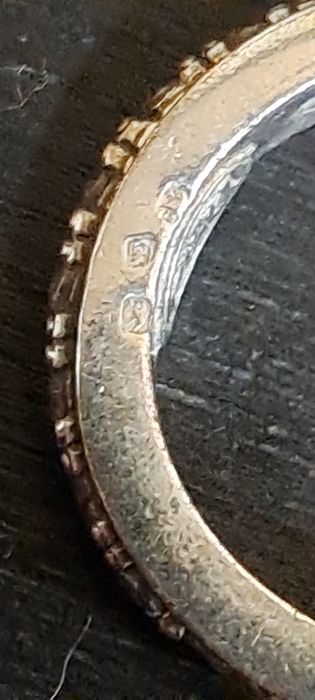 Anel rotativo em Ouro e Prata.