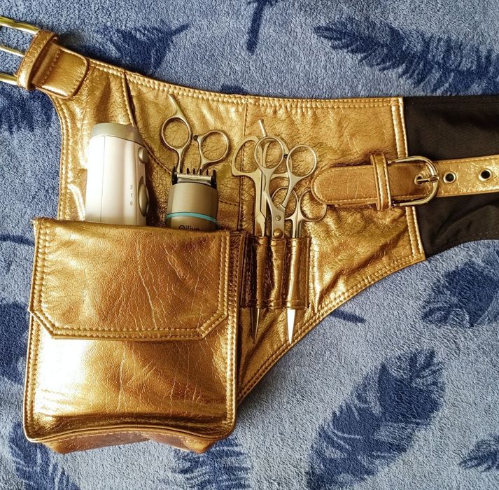 Pas fryzjerski chociaż niekoniecznie, złota skóra syntetyczna.