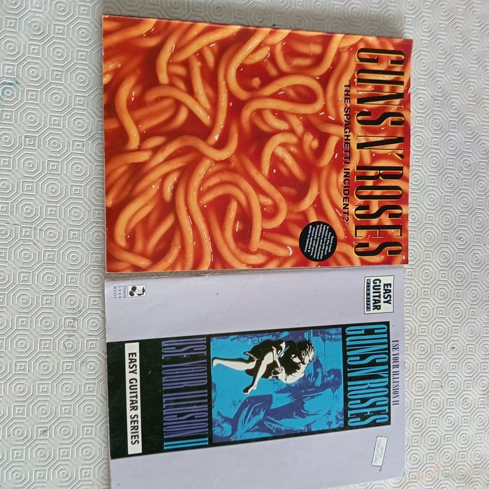 Livros de pautas The Cure, U2, Guns & Roses