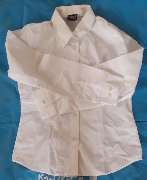 рубашки новые девичьи, школьные.