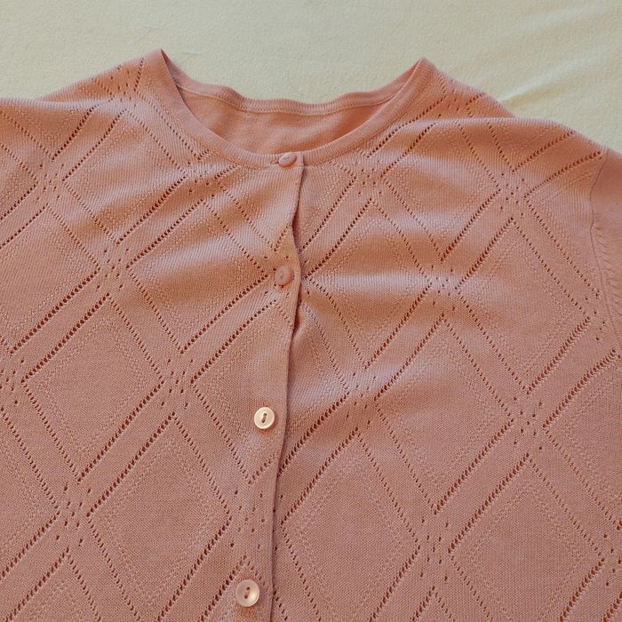 Lekki różowy sweterek