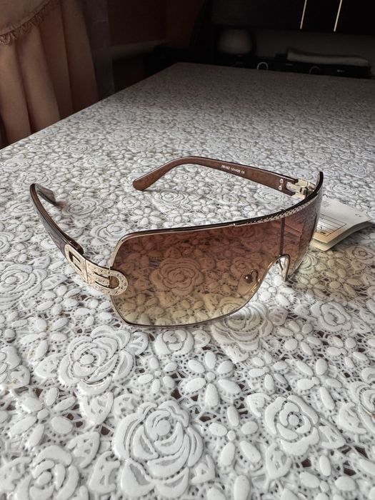 Окуляри Louis Vuitton, Gucci