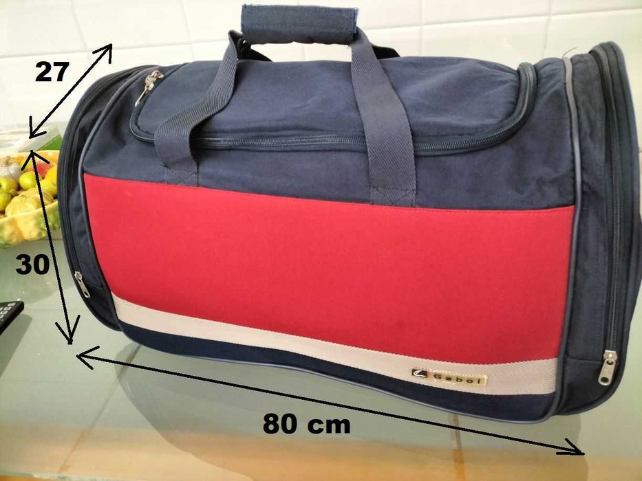Saco de viagem Gabol azul e vermelho