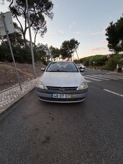 Opel Corsa 1.2 c/ teto de abrir