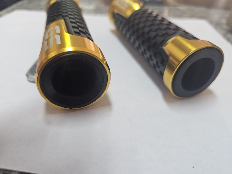 Punhos de guiador para mota