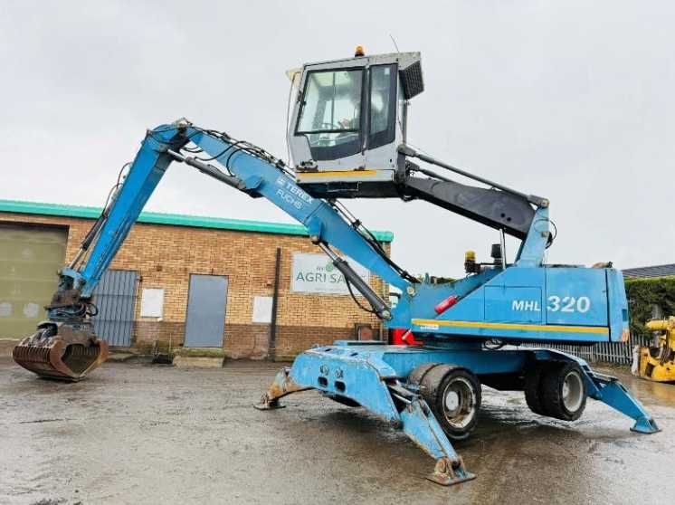 Екскаватор для перевалки лісу , металолома FUCHS MHL 320