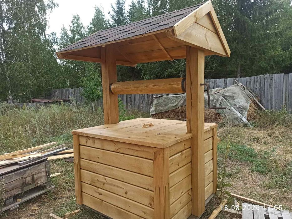 Дерев'яна криниця нова